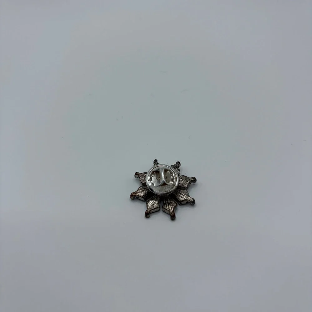 Vintage Snowflake Pin Iridescent AB Rhinestone Starburst Gunmetal Lapel Brooch
